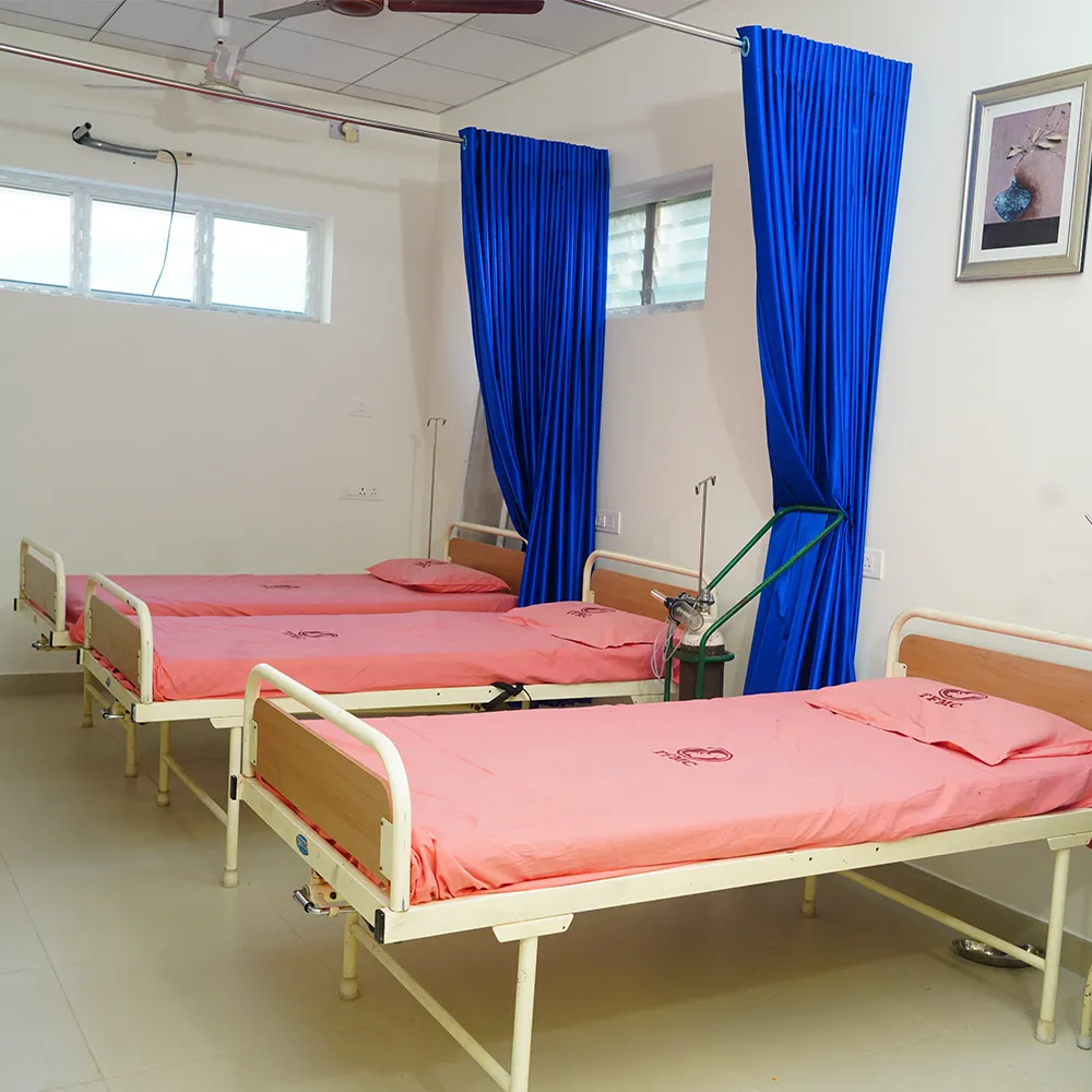 Recovery ward with beds and privacy curtains
