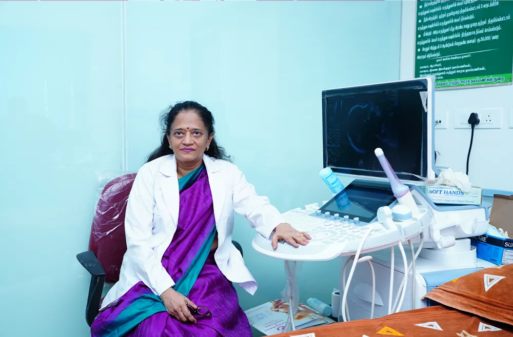 A fetal medicine specialist at the ultrasound console during a scan